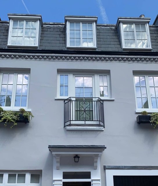 Freshly painted townhouse exterior and windows by JC Johnson Decorating