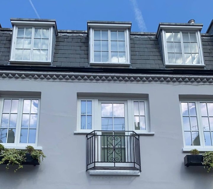 Freshly painted townhouse exterior and windows by JC Johnson Decorating
